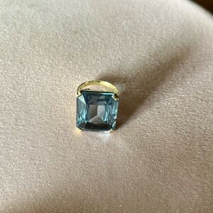 Size 6 1/2 blue topaz cocktail ring set in 14ct yellow gold